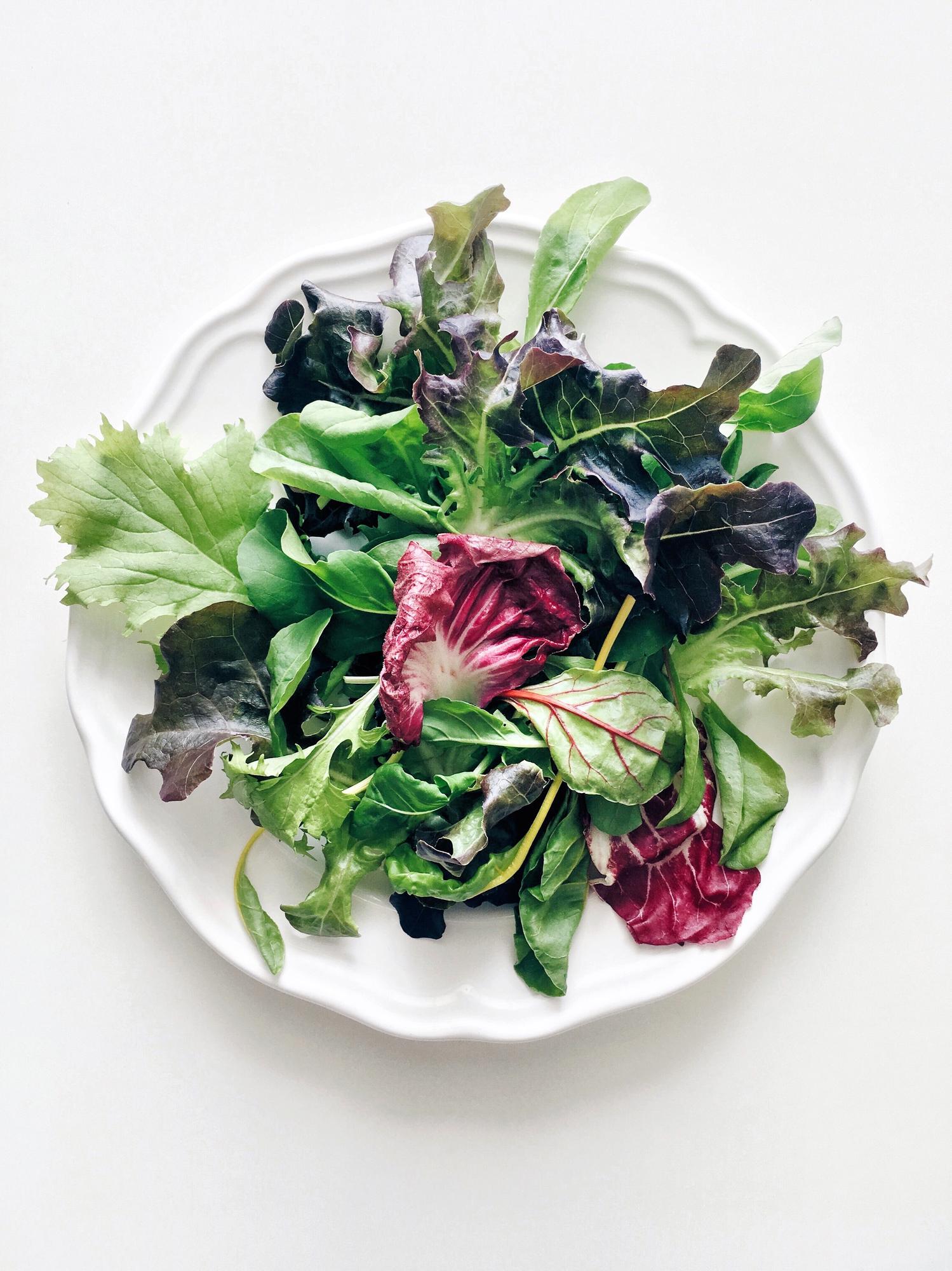 Large plated seasonal salad with herbs